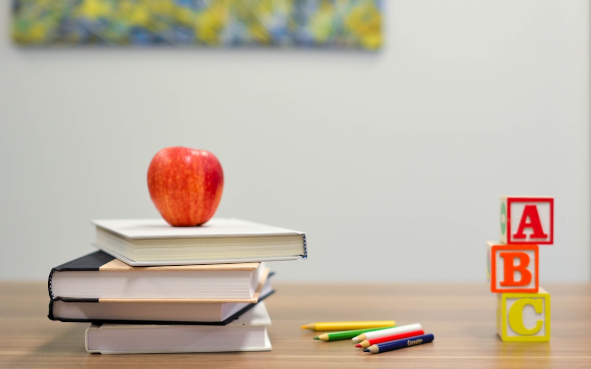 Classroom setting representing teacher library management and checkout flows
