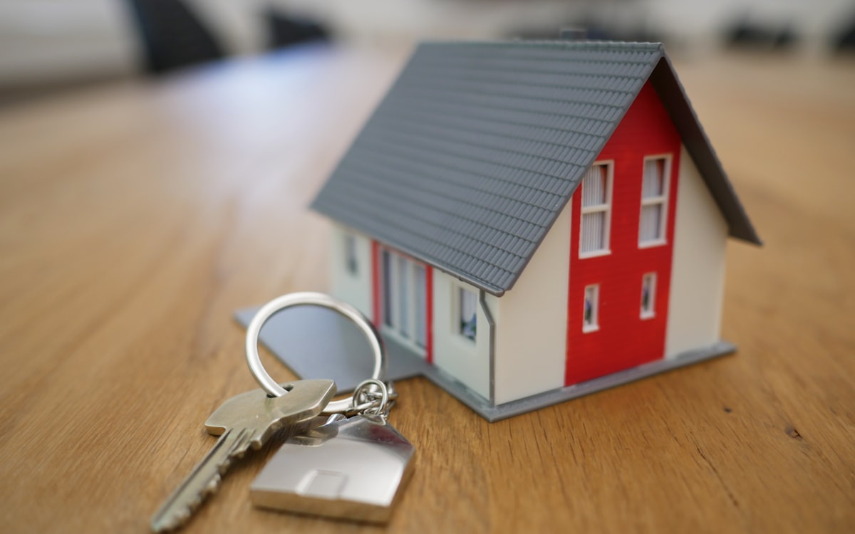 Keys and property documents representing underwriting and operations